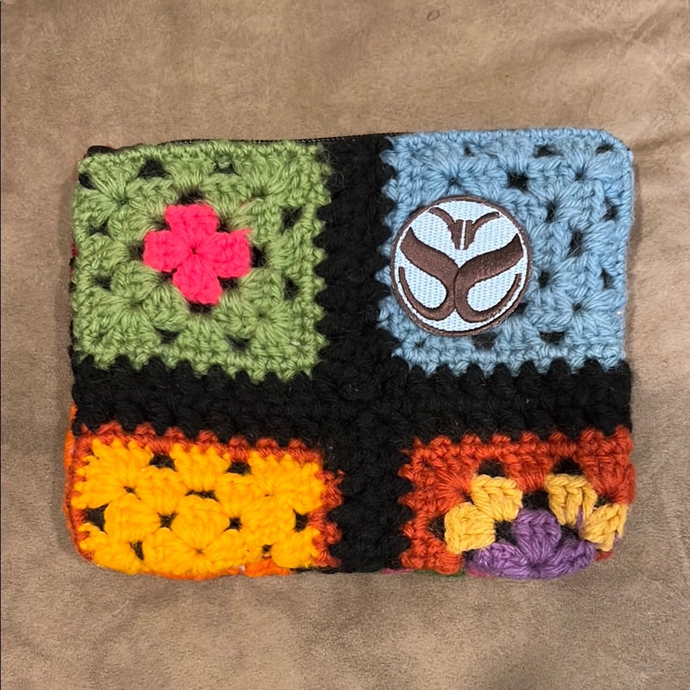 Salvage Sacs NWT Colorful Crochet Cosmetic Bag. Has crochet squares on both side